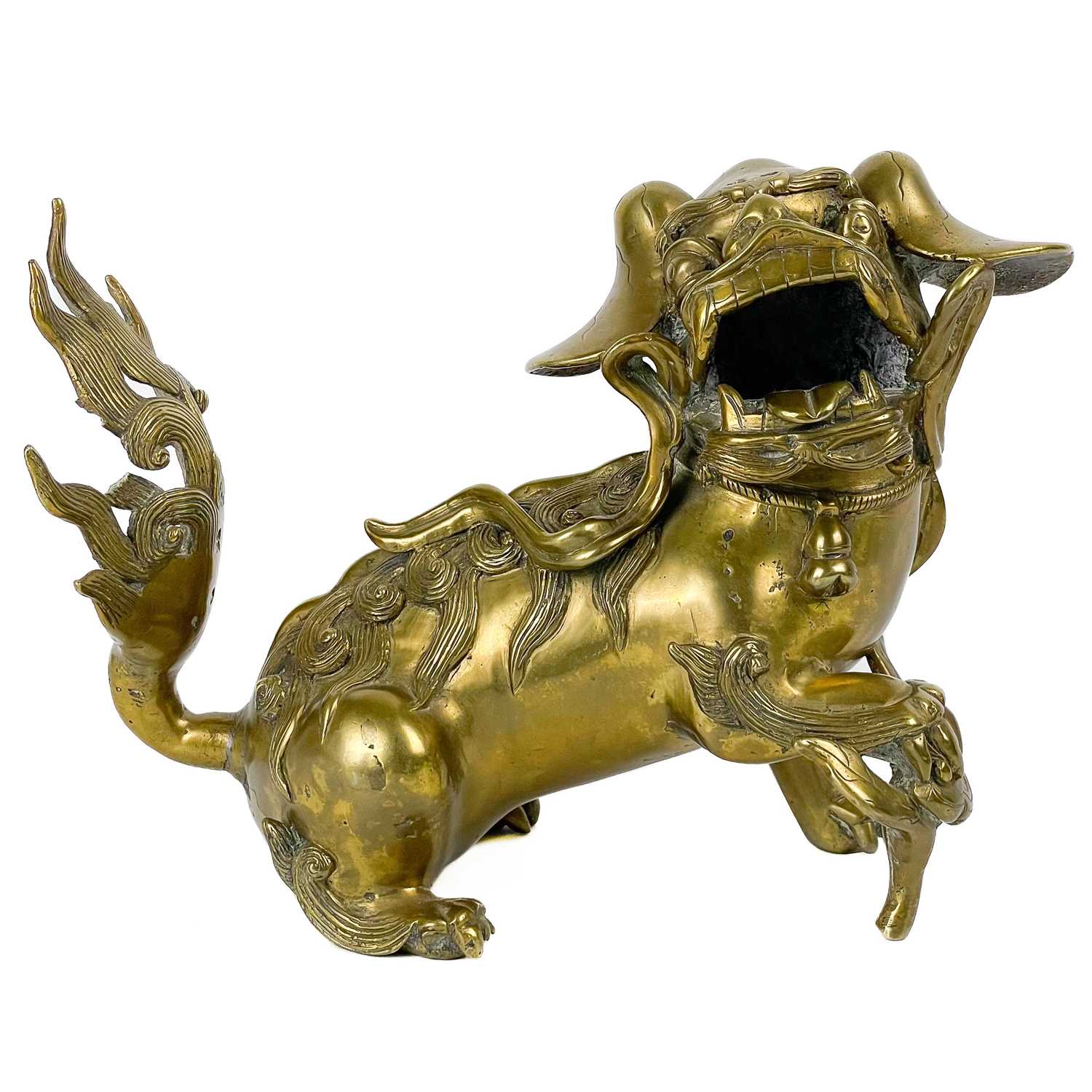 Lot 1424 - A Chinese polished bronze model of a dog of fo, late 19th century.