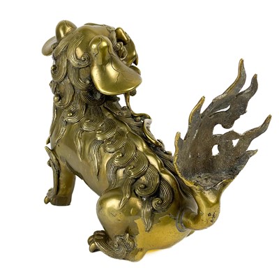 Lot 1424 - A Chinese polished bronze model of a dog of fo, late 19th century.