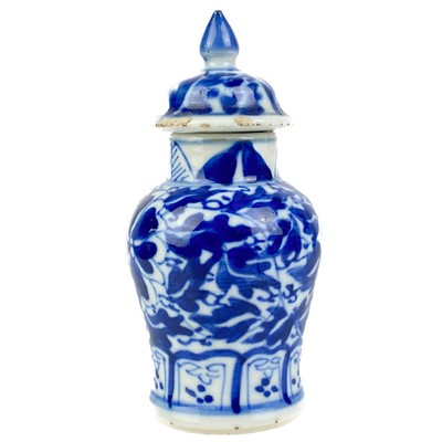 Lot 1408 - A small Chinese blue and white porcelain vase, 19th century.