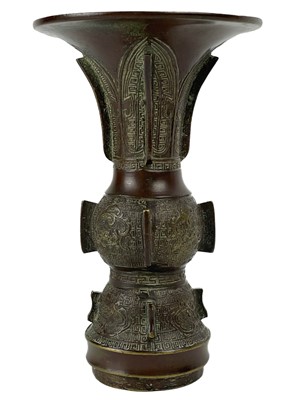 Lot 1425 - A Chinese bronze Gu vase, late 19th century.