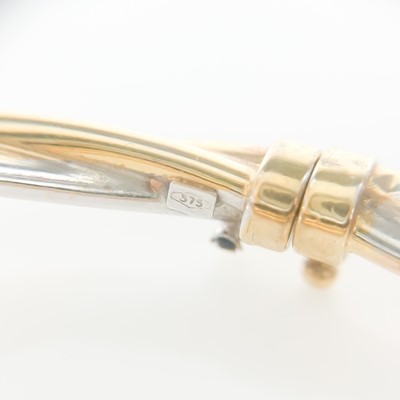 Lot 229 - Two 9ct hollow tubular bangles.