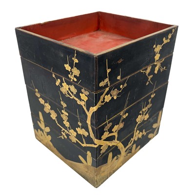 Lot 1431 - Four Japanese black lacquered stacking boxes, circa 1900.