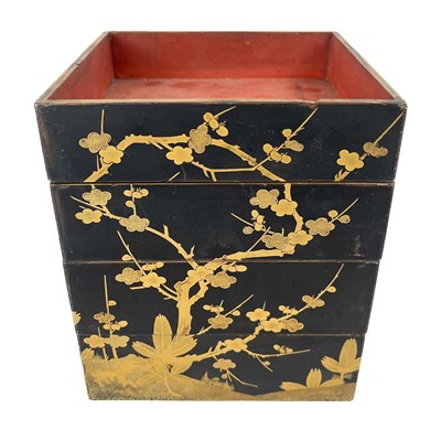 Lot 1431 - Four Japanese black lacquered stacking boxes, circa 1900.