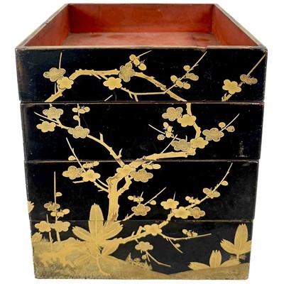 Lot 1431 - Four Japanese black lacquered stacking boxes, circa 1900.