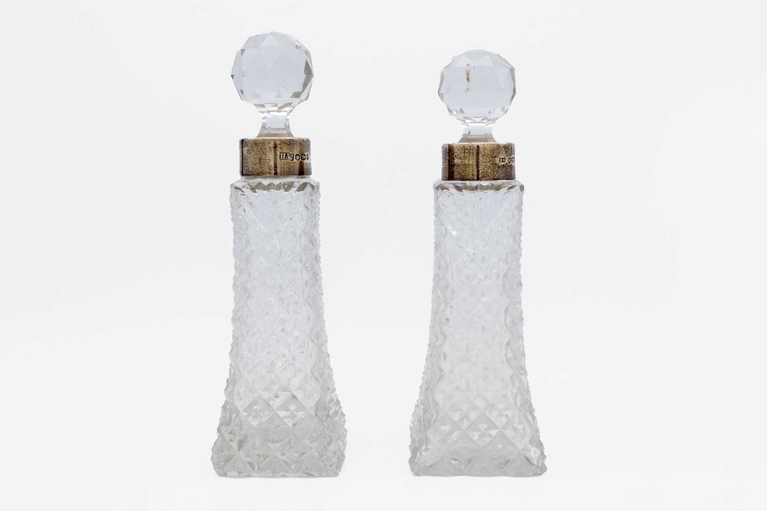 Lot 7 - A pair of Victorian silver-mounted cut glass decanters by Lee & Wigfull.