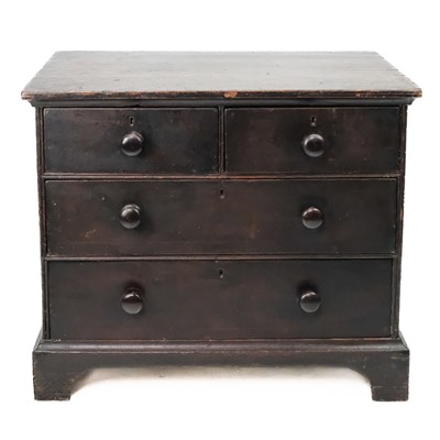 Lot 83 - A late George III stained pine chest.