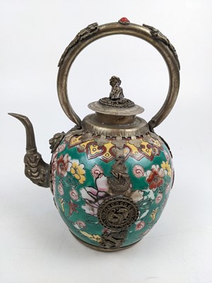 Lot 1465 - A Chinese porcelain and white metal teapot, early 20th century.