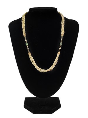 Lot 292 - A multi-strand seed pearl and chain emerald set necklace.