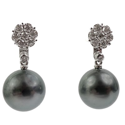 Lot 258 - A pair of contemporary 18ct white gold diamond set large grey cultured pearl drop earrings.
