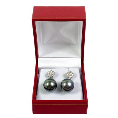 Lot 258 - A pair of contemporary 18ct white gold diamond set large grey cultured pearl drop earrings.