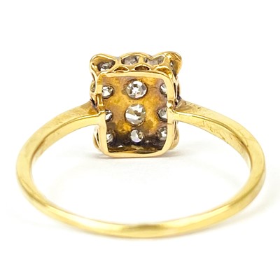 Lot 165 - A diamond pave set panel gold ring.