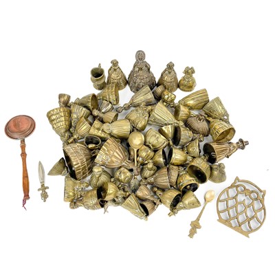 Lot 141 - A collection of brass crinoline lady bells.