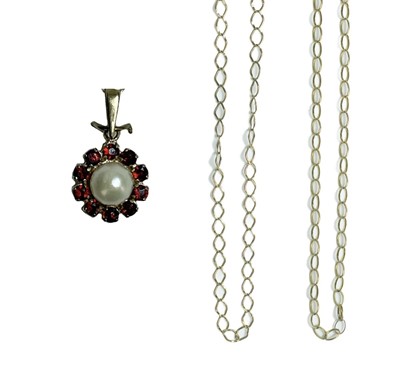 Lot 256 - Two 9ct necklaces and a garnet and pearl set pendant necklace.