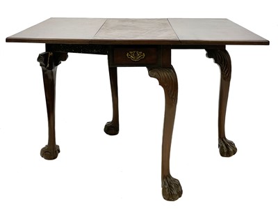 Lot 690 - A George II mahogany twin-flap dining table.