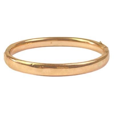 Lot 298 - A 9ct hinged hollow bangle.