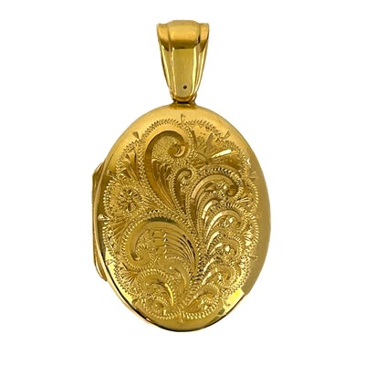 Lot 127 - A modern 9ct oval engraved locket by Charles Green.