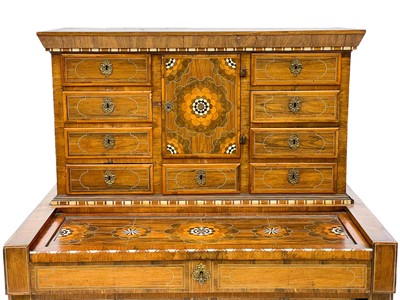 Lot 746 - An Italian walnut, rosewood, bone, and ebony inlaid cabinet.