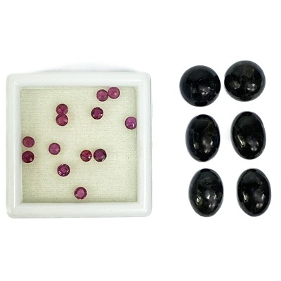 Lot 239 - A parcel of thirteen loose round-cut rubies, 2.44ct.