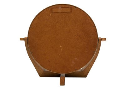 Lot 64 - A mid century walnut inlaid circular dressing table mirror.