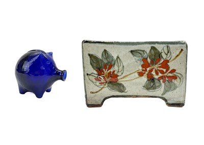 Lot 395 - A Bristol blue pig money box.