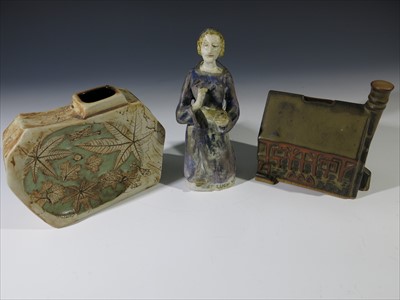 Lot 953 - An E.K. Scanlan pottery figure of St Lucy,...