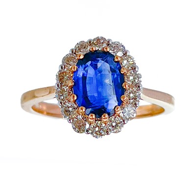 Lot 5 - An 18ct rose gold certified kyanite and diamond cluster ring.