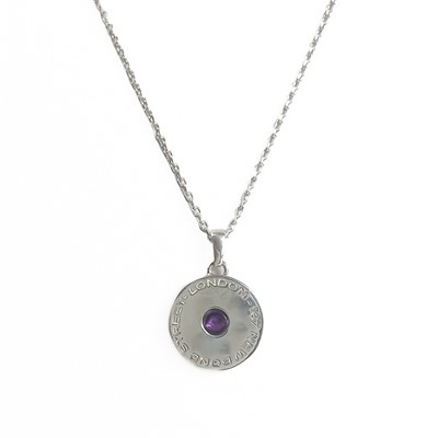 Lot 411A - Asprey sterling silver button pendant set with an amethyst.