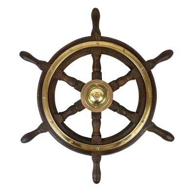 Lot 14 - A six spoke teak and brass bound yacht wheel by Simpson Lawrence.