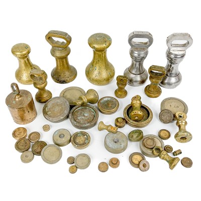 Lot 83 - A collection of various brass postal weights.