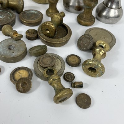 Lot 83 - A collection of various brass postal weights.