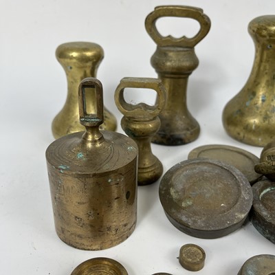 Lot 83 - A collection of various brass postal weights.