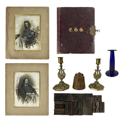 Lot 107 - A pair of Victorian opaque glass portrait photographs.