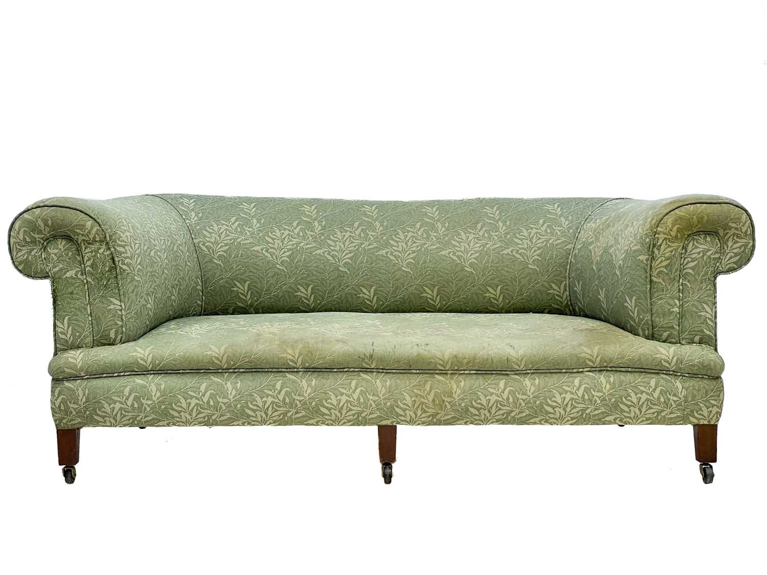 Lot 712 - An Edwardian Chesterfield settee.