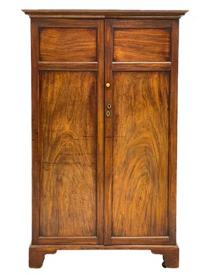 Lot 669 - A mahogany two-door wardrobe.