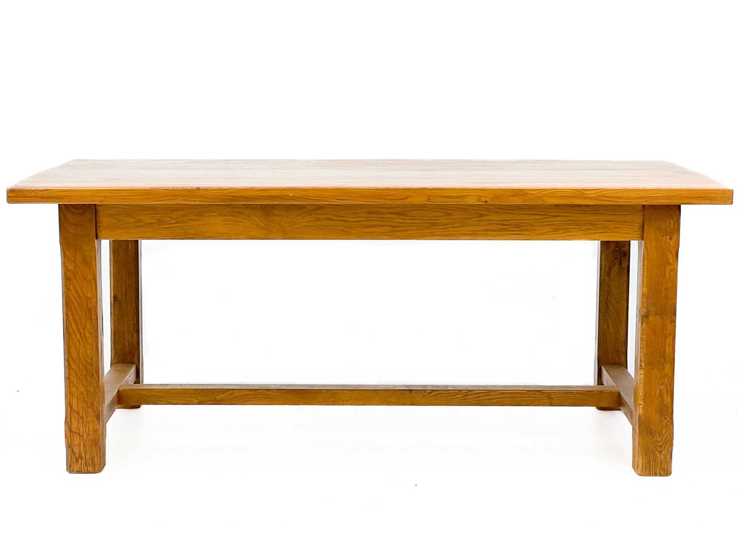 Lot 677 - A contemporary oak dining table.