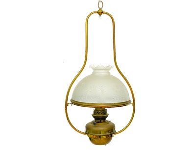 Lot 186 - A brass and copper hanging oil lamp.