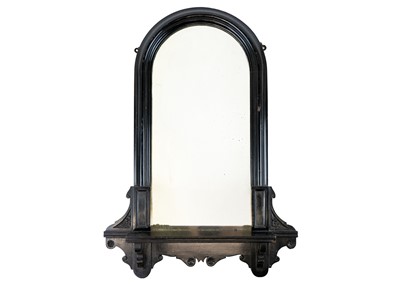 Lot 153 - A small Victorian Aesthetic movement ebonised arched mirror.