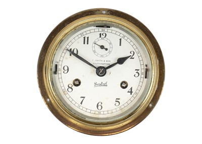 Lot 376 - A Sestrel bulkhead clock for F. Smith & Son Southampton