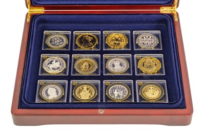 Lot 113 - Cased crown sized (approx.) "The Millionaires Collection" set of 12 coins