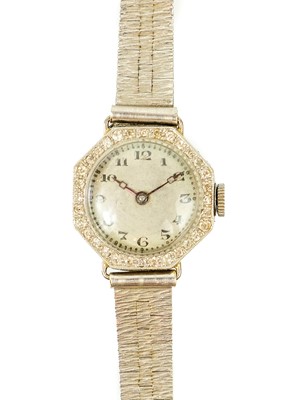 Lot 163 - An Art Deco 18ct & platinum diamond set lady's cocktail wristwatch, with 9ct bracelet.