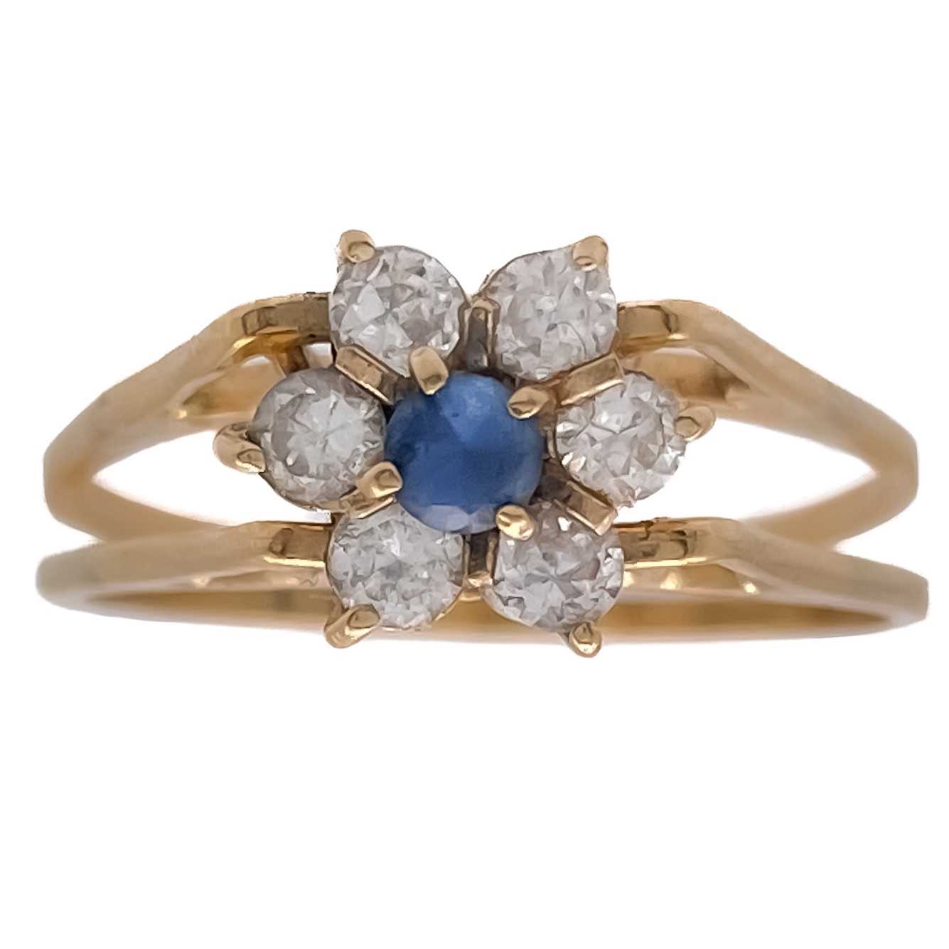 Lot 129 - A cluster gem set reversible gold ring.