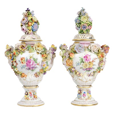 Lot 413 - A pair of Carl Thieme Potschapel twin handled vases and pierced covers.