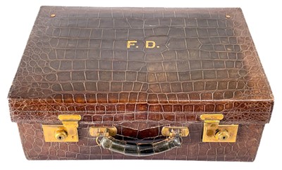 Lot 531 - A good Edwardian Harrods London crocodile leather vanity suitcase with 9ct bottles.
