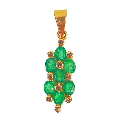 Lot 283 - An 18ct emerald and diamond set pendant.