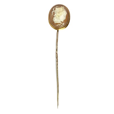 Lot 14 - A Victorian gold mounted shell cameo shell stick pin.