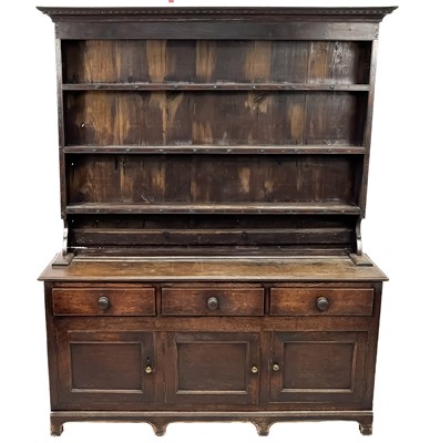 Lot 39 - A George III oak dresser.