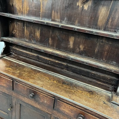 Lot 39 - A George III oak dresser.