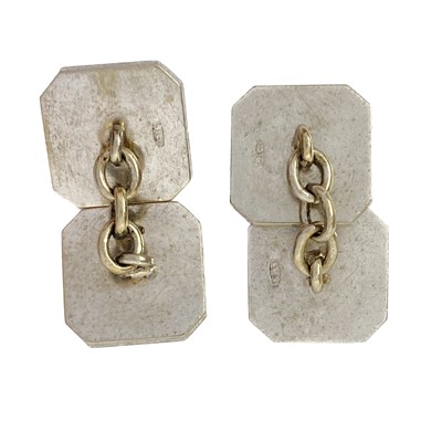 Lot 47 - A pair of 9ct white gold bloodstone set cufflinks.