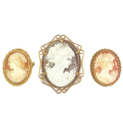 Lot 257 - Three 9ct mounted shell cameo brooches.