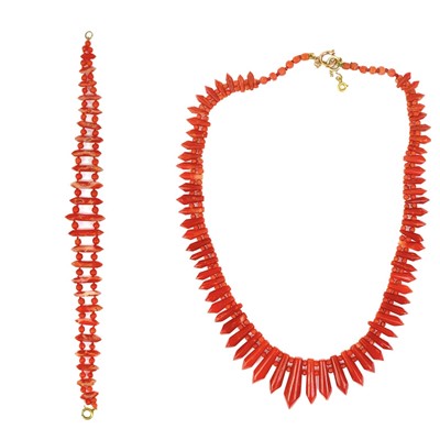 Lot 111 - Coral fringe necklace and bracelet set.